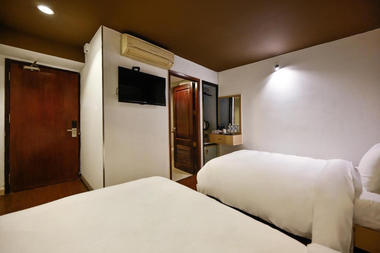 The Noble Swan Hotel New World Хошимин Екстериор снимка